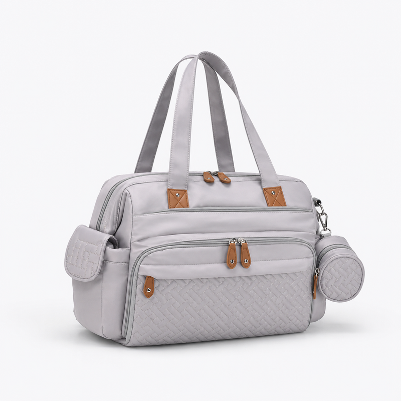 Sac à langer multifonction Securidou gris clair, vue d'ensemble avec poches latérales et pochette tétine