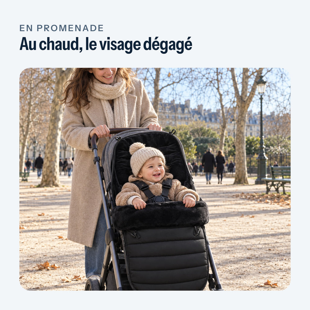 Parent en promenade, bébé dans la chancelière noire, visage dégagé