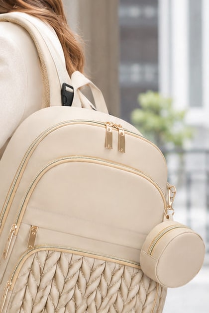 Sac à dos à langer Securidou porté à l’épaule