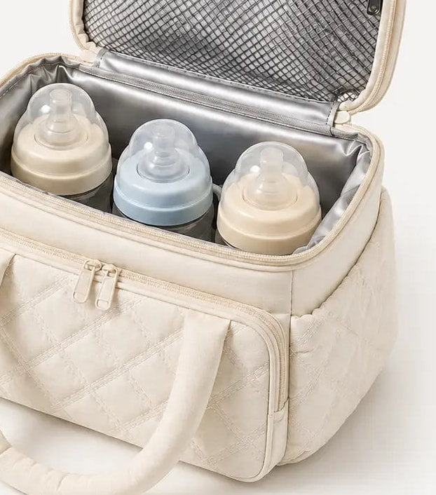 Compartiment isotherme ouvert du sac isotherme biberon Securidou, avec trois biberons